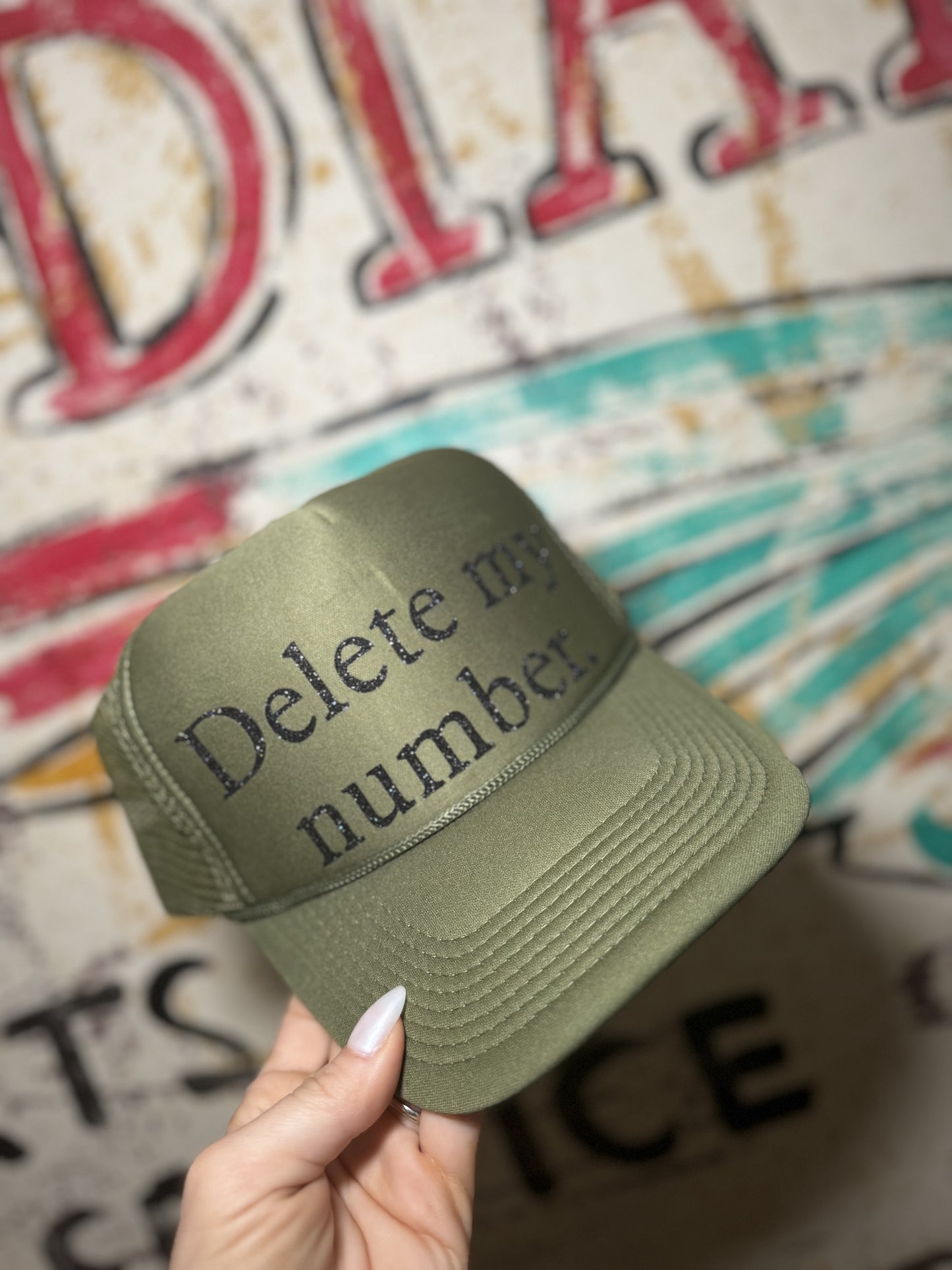 Delete my number trucker hat